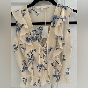 Lydelle top with side zipper.